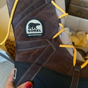 Sorel Tobacco and Black Glacy Explorer Boots